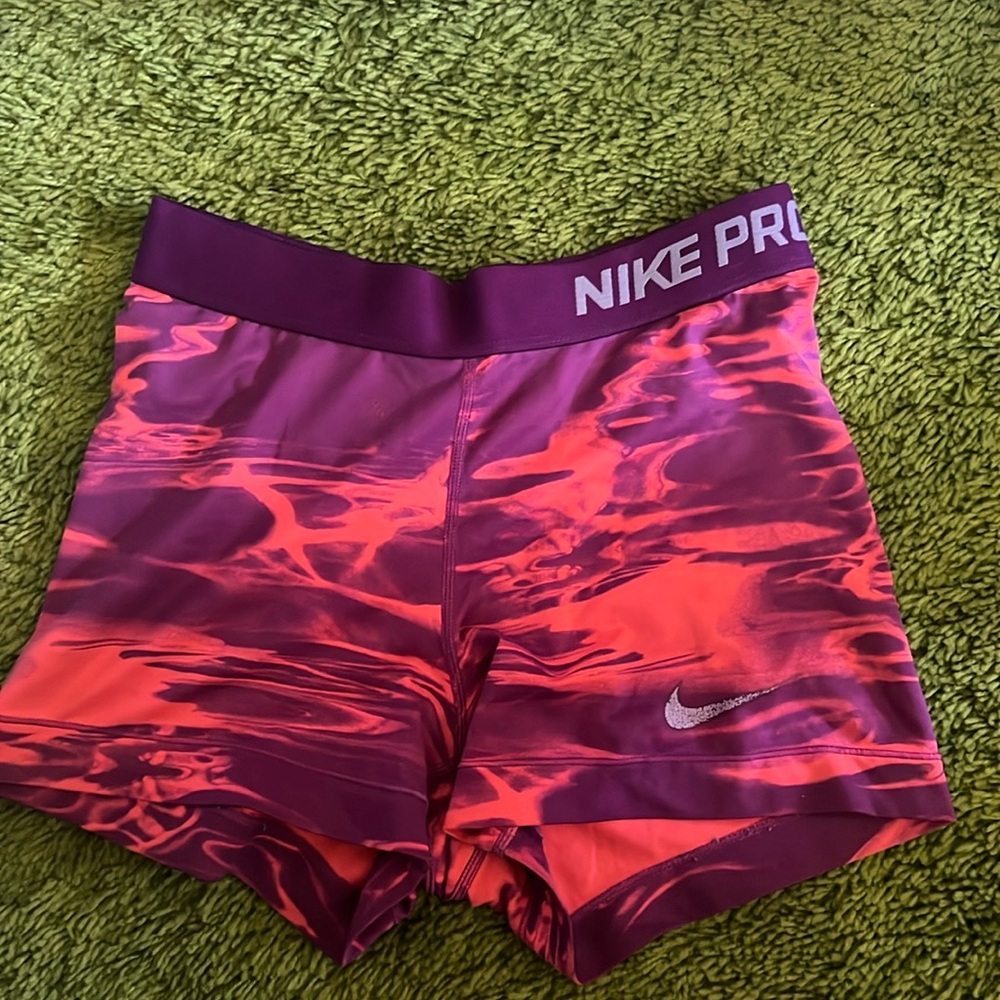 Nike pros, bright pink and purple marble color,great condition